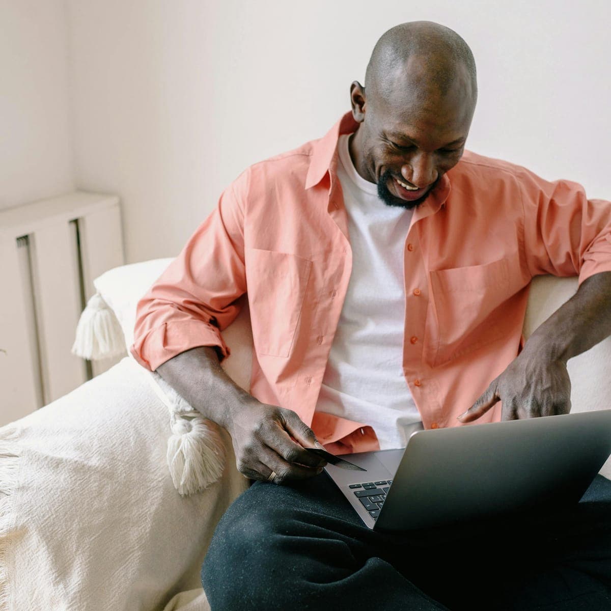 A man browsing brands on his laptop